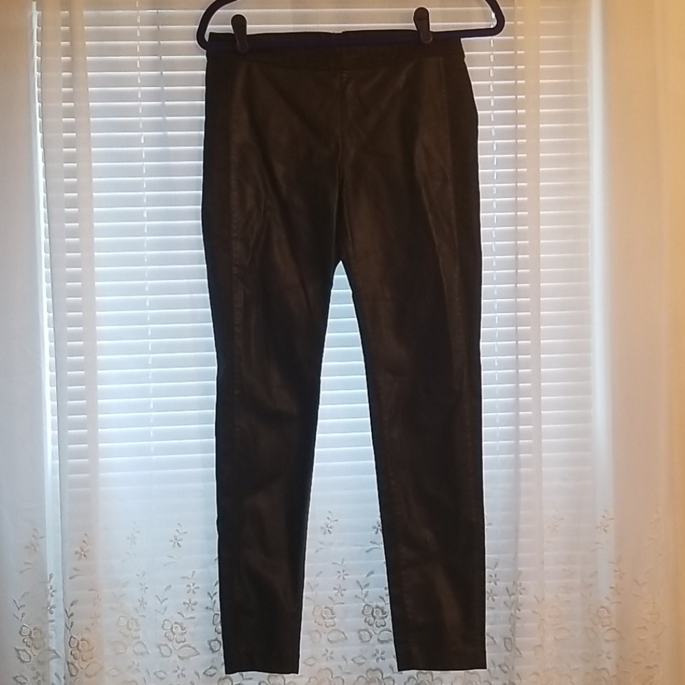 Black faux leather and fabric pant.